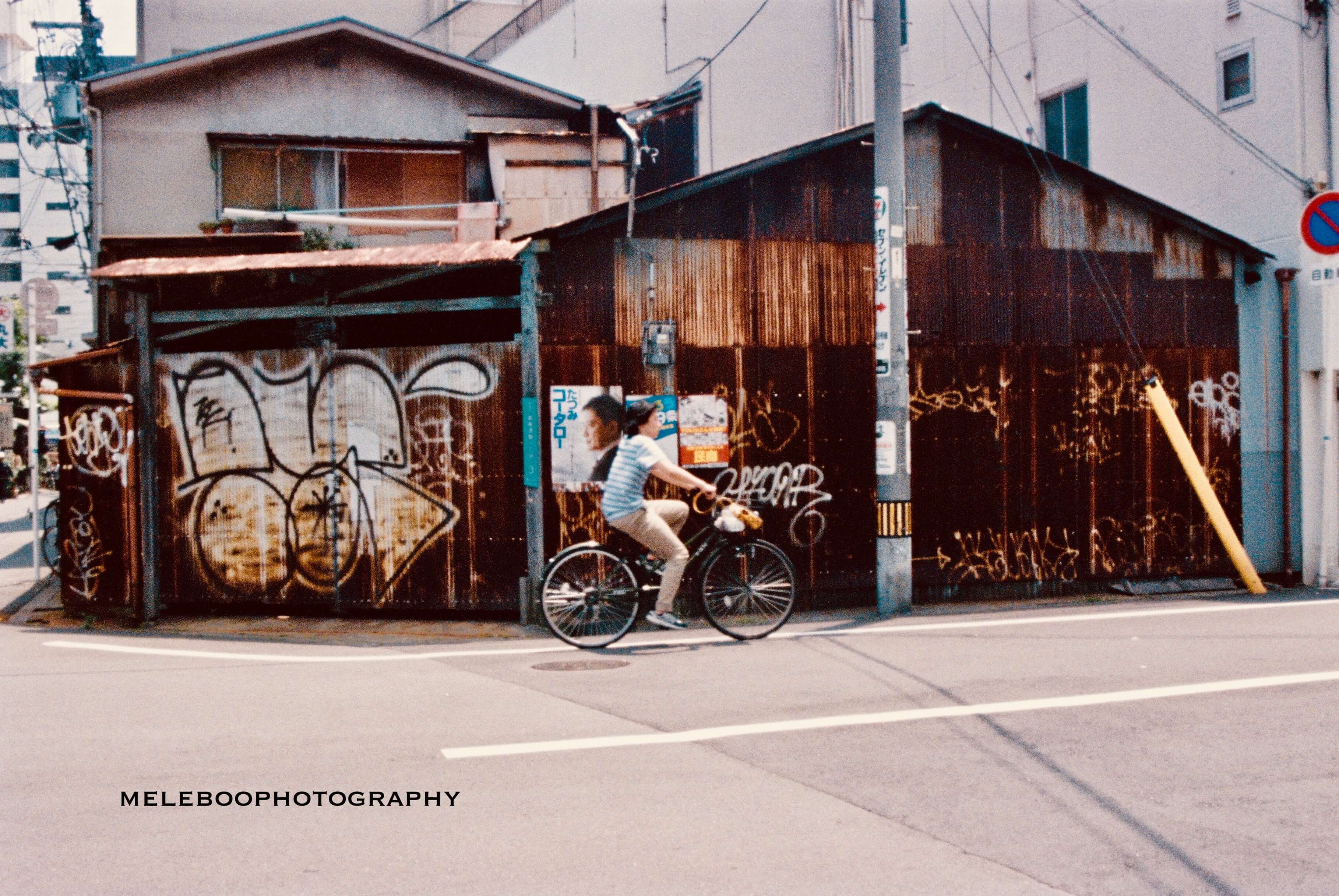 lady cycling in Osaka