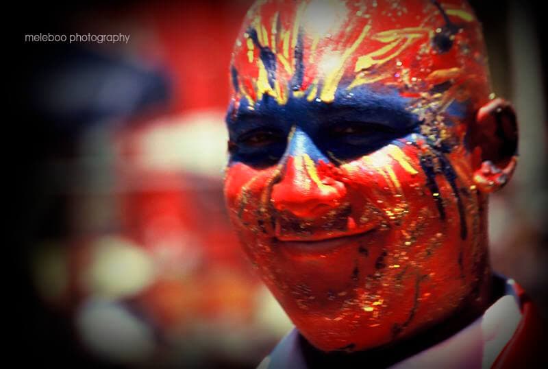 painted face of a Cape Coon