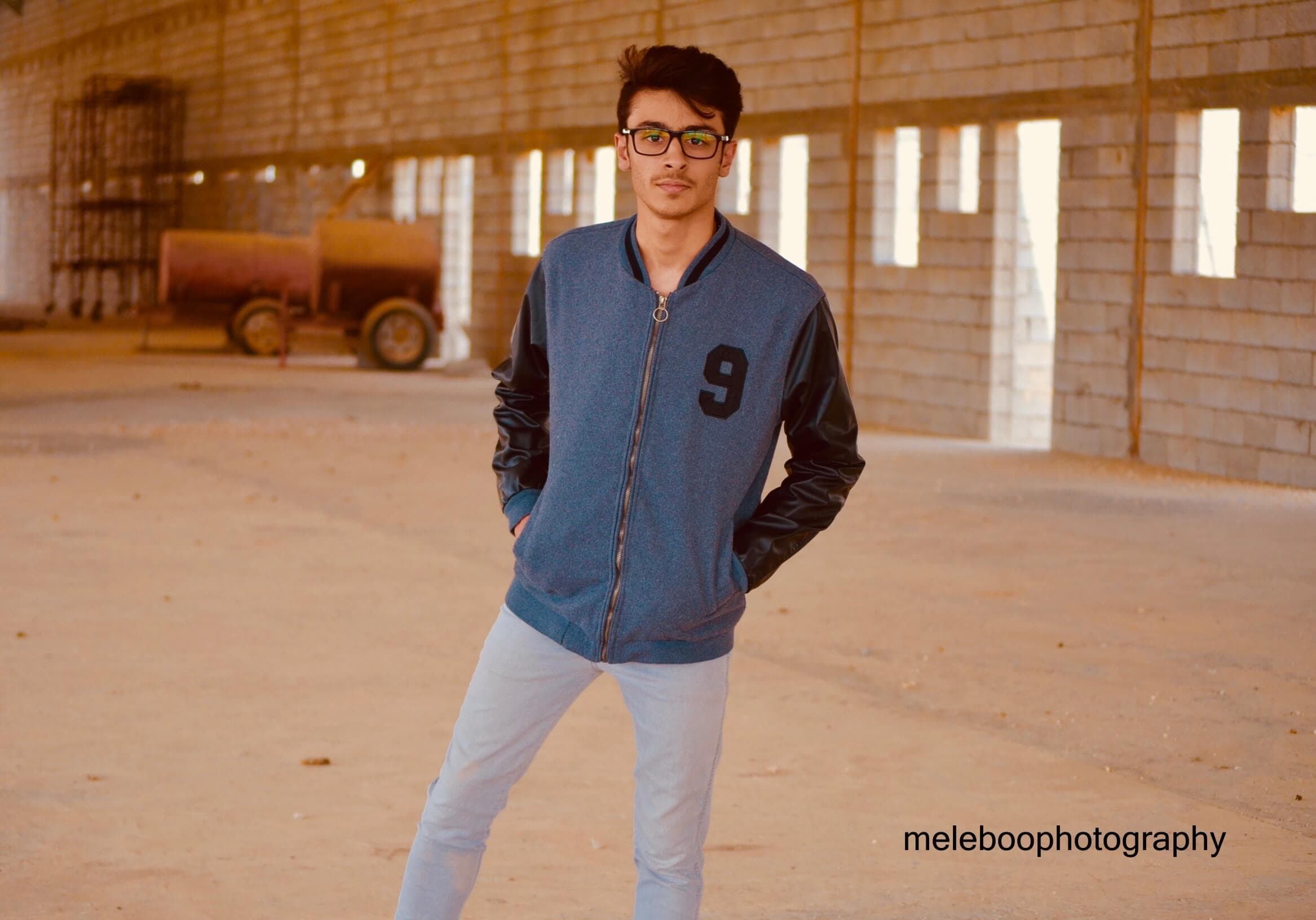 hassan wearing a jacket