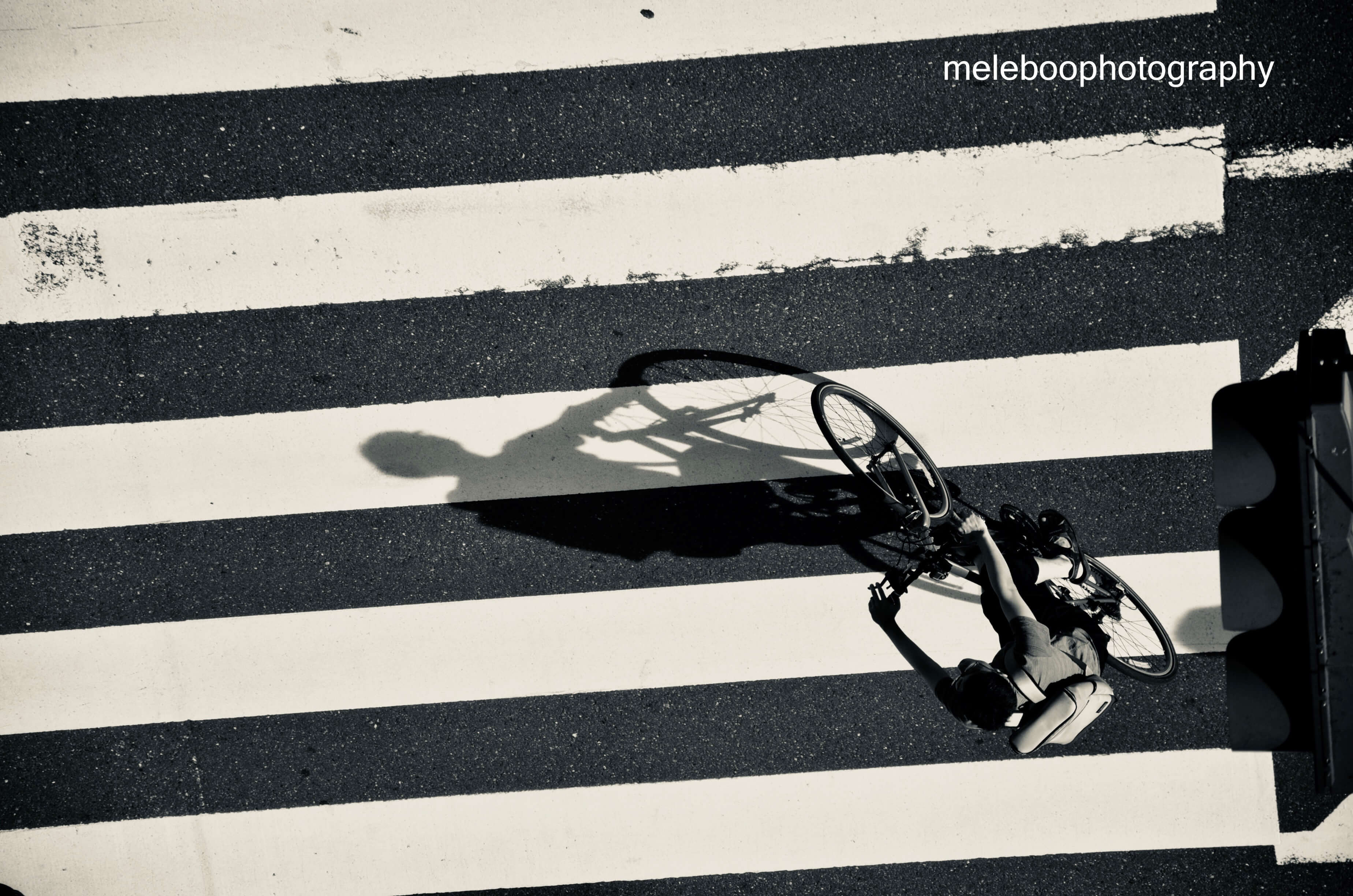 cyclist crossing street