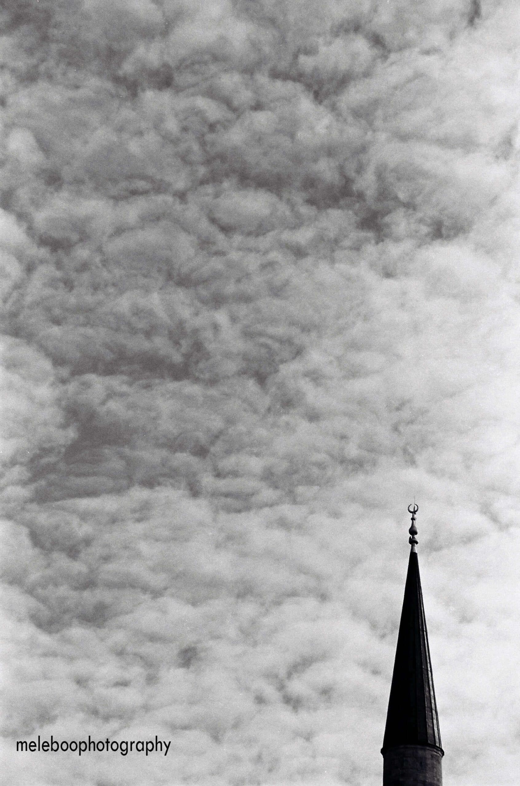 minaret and clouds