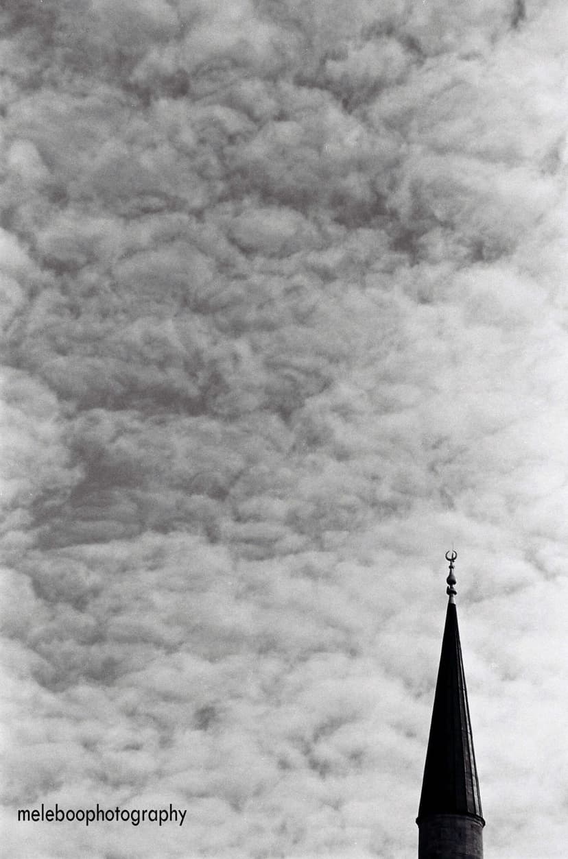minaret and clouds