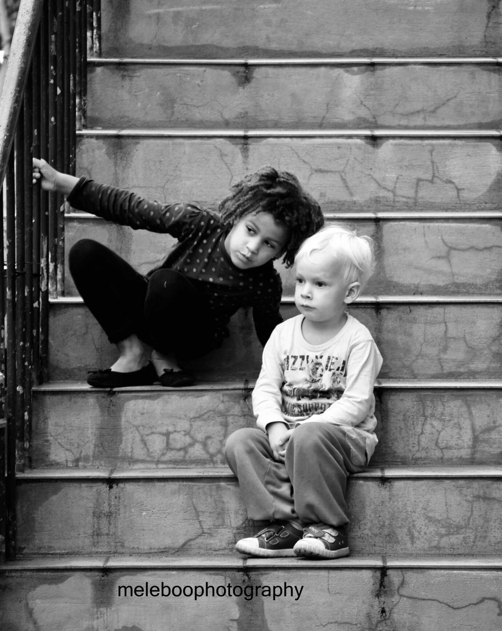 boy and girl on steps